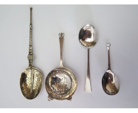 An Edward VII Silver Gilt Spoon, Birmingham 1902, Elkington & Co., tea strainer, caddy spoon and one other, 120g