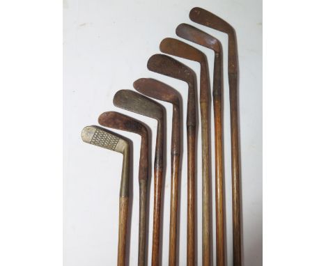 A Collection of Eight Golf Putters: Crowley, Army & Navy, Nidlick