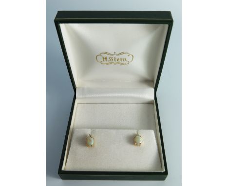 A Pair of 14k Opal and Diamond Earrings