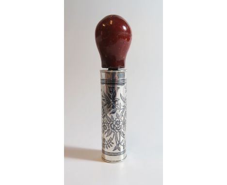 A Persian Niello Silver Cane Handle with Amber Finial, decorated with foliage, birds and script, 82mm