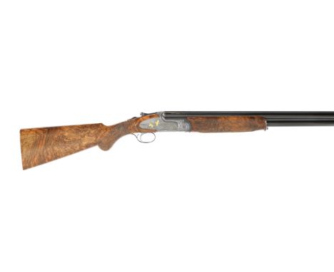 A 12-bore 'S782 EMEL' single-trigger side-plated over-and-under ejector gun by Rizzini, no. 69925Hold-open pierced toplever, 