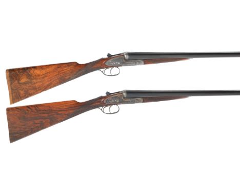 A pair of 12-bore sidelock ejector guns by Army &amp; Navy, no. 66786/7The actions with bouquet and foliate-scroll engraving,