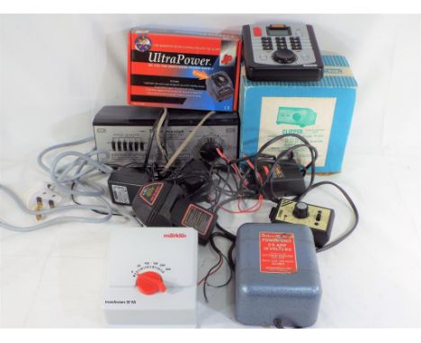 Model Railways - seven power controllers by Hornby Marklin and H & M to include a Hornby Digital controller, condition vg to 