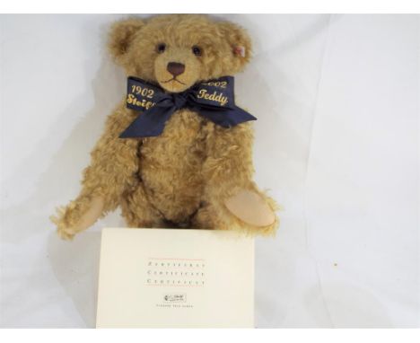 A Steiff blond mohair Growler Bear with jointed legs and arms, the Jubilee Bear, 45 cm (high)stitched nose with white label a