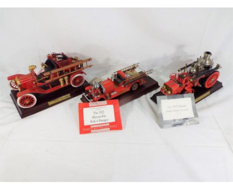 Franklin Mint - three unboxed fire engines comprising a 1912 Christie Front Drive Steamer, a 1922 Ahrens-Fox AK4  (one wheel 