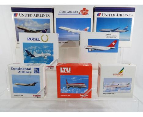 Herpa - eight 1:500 scale boxed planes comprising 501040, 501002, 506328, 500883, 500746, 503747, 503051 and 503600, conditio