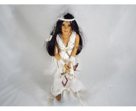 Aston Drake Galleries - Porcelain doll 'Love Takes Wing' by artist Sandra Bilotto. Item is in near mint condition and is 54 c
