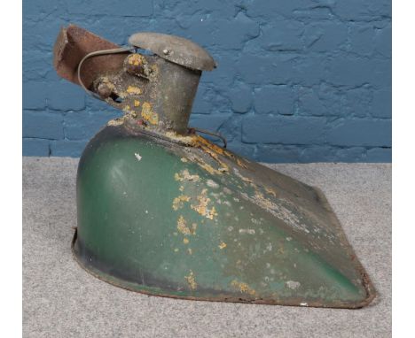 A large vintage flood light.  