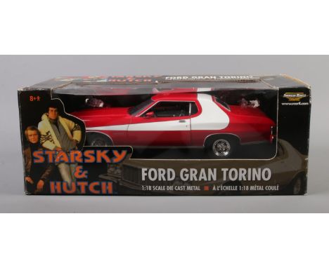 A boxed ERTL American Muscle 1:18 scale Starsky and Hutch Ford Grand Torino, item 36685.  