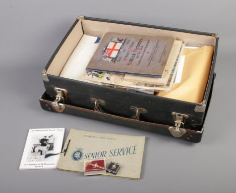 A collection of Naval themed memorabilia including postcards, first day covers and brooches.  