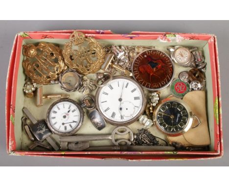 A tray of vintage costume jewellery. Includes silver pocket and fob watch, RAF badges etc.  