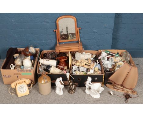 Four boxes of miscellaneous. Including ceramic figures, wall clock, rotary dial telephone, toilet mirror, flagon, table lamps