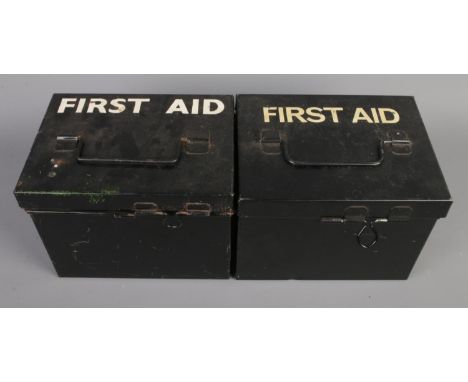 Two metal first aid boxes with contents of medical supplies.  