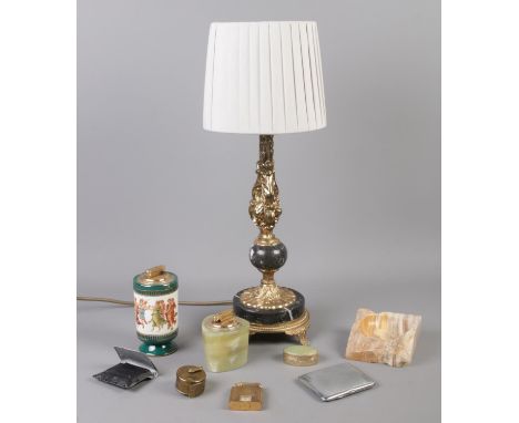 An assortment of collectables, to include mainly smoking related items. Includes table lamp, Calibri Monopol lighter and mini