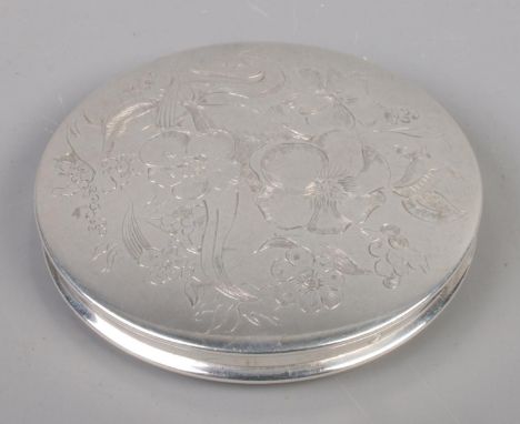 A George VI silver powder compact. Assayed London 1947 by Roberts &amp; Dore Ltd.  