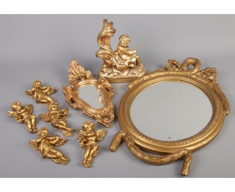 A quantity of gilt composite items. Including mirrors, cherubs, table lamp base, etc.  