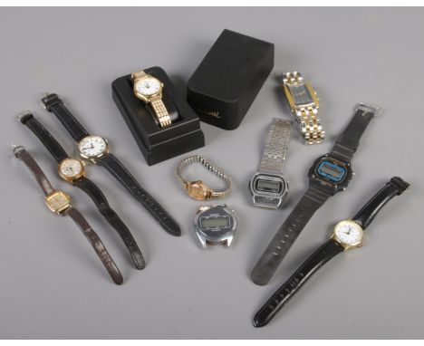 A box of ladies and gents wristwatches. Includes LianHao, Imado digital watch head, ladies gold plated manual Oris etc  
