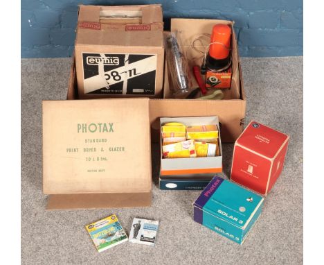 A quantity of projection equipment. Including Eumig projector, Paterson darkroom lamp, Photax print dryer, Charlie Chaplin fi