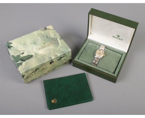 A ladies bi metal Rolex Oyster Perpetual chronometer wristwatch. With box and papers.  Working order.