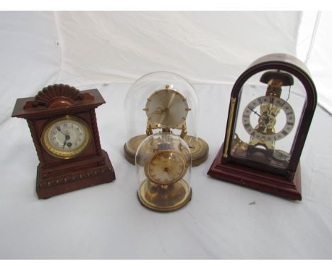 Two anniversary clocks, a modern skeleton clock and an American mantel clock (4) 