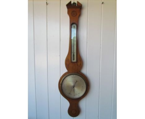 A 19th Century broken arch top mahogany and shell inlaid 8" wheel barometer with arched and moulded long thermometer box, mak