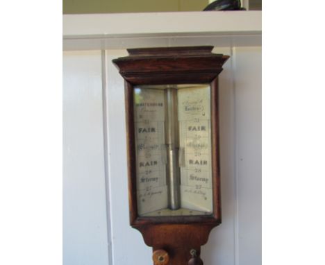 A mid 19th Century oak stick barometer with moulded top (loose) ivory dial and vernier gauges signed Whiehouse, Optician, Cov