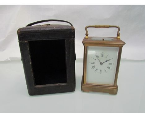 A 19th Century brass carriage clock, Roman enamel dial, striking and repeat movement, with leather carry case a/f, 5"high (ex