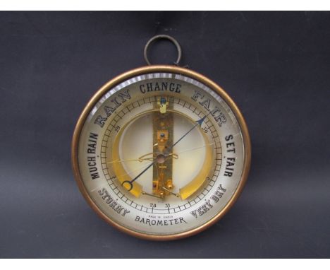 A brass cased aneroid barometer a/f