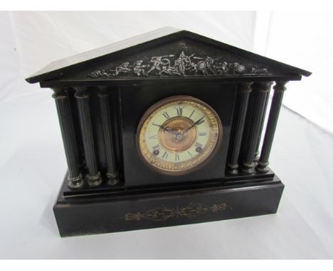 A Victorian Ansonia cast iron mantel clock of architectural form 