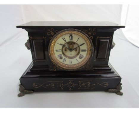 A Victorian Ansonia cast iron mantel clock of architectural form 