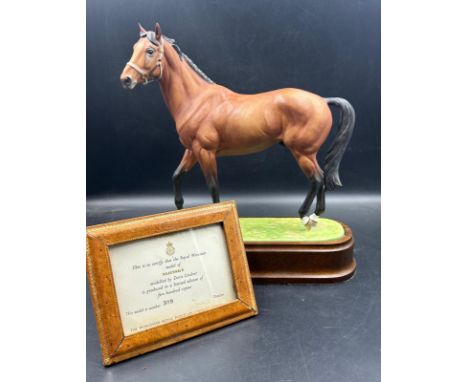 A limited edition Royal Worcester figure of the racehorse Najinsky modelled by Doris Linder model number 309 of 500