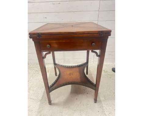 Handkerchief card/games table, tooled leather top and tiered design in the manner of Theodore Alexander (H74cm Sq77cm)