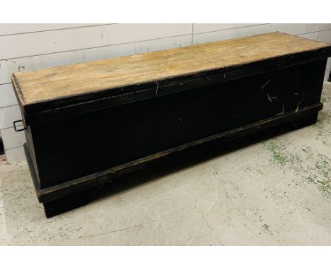 A long painted pine hall chest, the bench style chest lid opens to storage (H56cm W189cm D49cm)