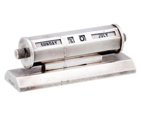 An Elizabeth II silver desk calendar, engine turned, 13cm l, by Walker &amp; Hall Ltd, London 1959, loaded  Slight polish scr
