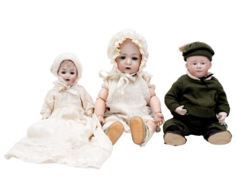 A Gebruder Heubach bisque head character doll, c1910, with intaglio eyes and closed mouth on composition bent limb body, in o
