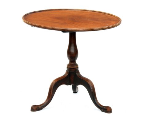 A mahogany tripod table, the dished top on associated George III baluster pillar, the legs with pad feet, 62cm h, 69cm diam  