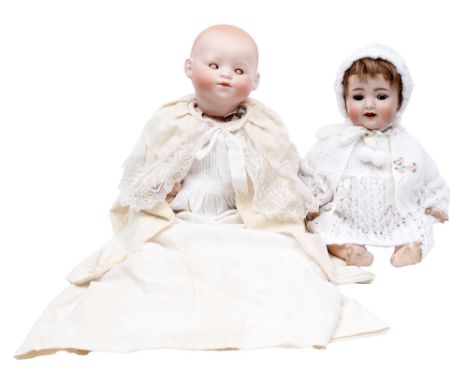 A Theodor Recknagel bisque head baby doll, c1920, with sleeping eyes and closed mouth, on composition bent limb body in conte