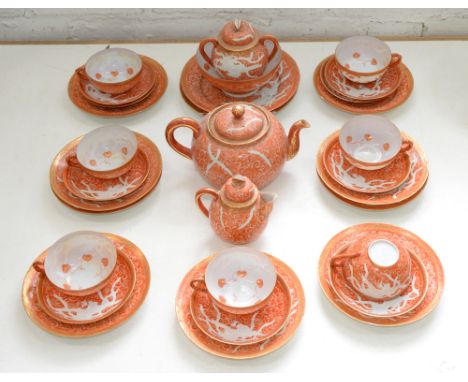 A Japanese eggshell tea service, first half 20th c, decorated with phoenixes, teapot 14.5cm h, painted markCracked and glued 