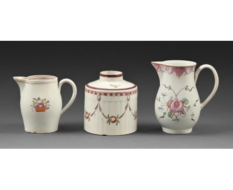 An engine turned and polychrome enamelled tea caddy and two milk jugs, c1790, larger jug 10.5cm h, collector's label  Provena