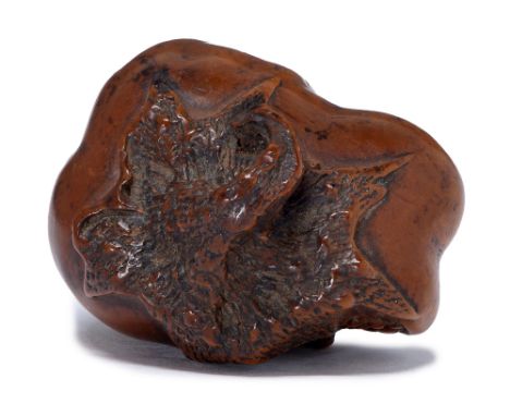 A Japanese wood netsuke of a pomegranate, 19th/20th c, 38 mm l, signed Masanao Provenance: Almost certainly acquired in Japan