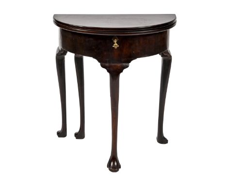 A George II mahogany tea table, on cabriole legs and pad feet, 72cm h; 33 x 66cm  Replacement hinge to gate and some cosmetic