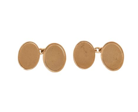 A pair of 9ct gold cuff links, engine turned, 19mm l, Birmingham 1967, 9.2g  Good condition, no initials
