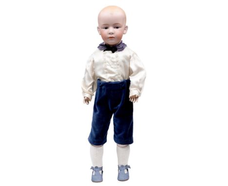 A Gebruder Heubach bisque 7602 character boy doll, c1912, bisque head with intaglio eyes, closed mouth and moulded hair, on j