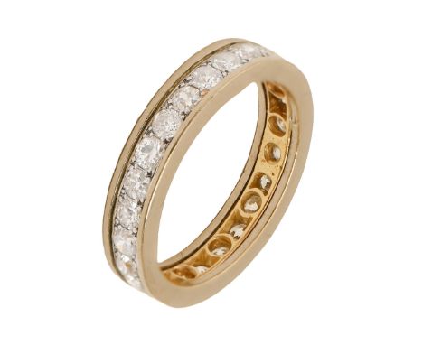 A diamond eternity ring, with round brilliant cut diamonds, in platinum and gold, 5.7g, size N  Light wear scratches