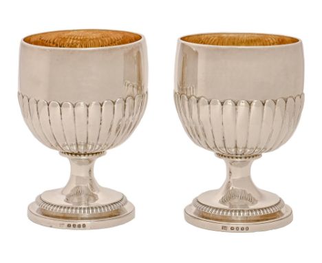 A pair of George III silver goblets, with lobed cup shaped bowl, 14.5cm h, by William Burwash and Richard Sibley, London 1808