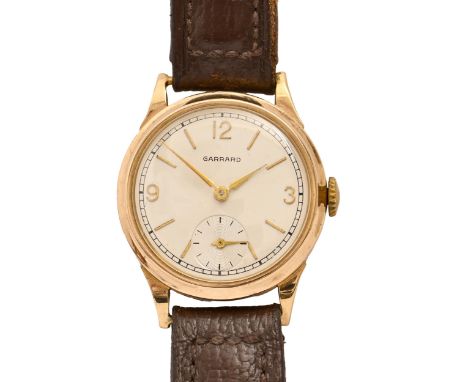 A Garrard 9ct gold wristwatch, 30mm diam, London 1957  Working order, movement clean