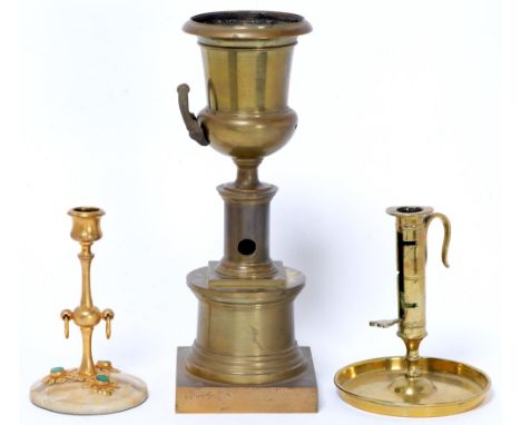A George IV brass colza lamp, 34cm h, a brass candlestick with ejector and a Victorian gilt brass and malachite mounted candl