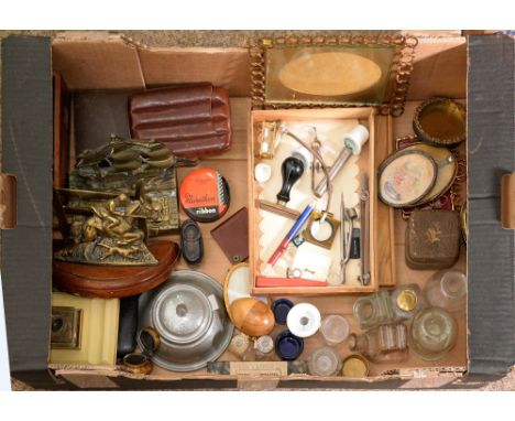 Miscellaneous desk and writing equipment, early 20th c, to include a brass inkwell in the form of a ship, a brass letter rack