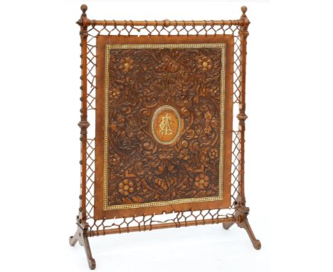 An Edwardian mahogany and gilt tooled Spanish leather country house firescreen, with central monogram, 127cm h, 93cm l  Minor