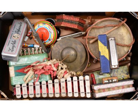 Miscellaneous children's musical instruments, 19th c and later, to include a pair of tambourines printed with countryside sce